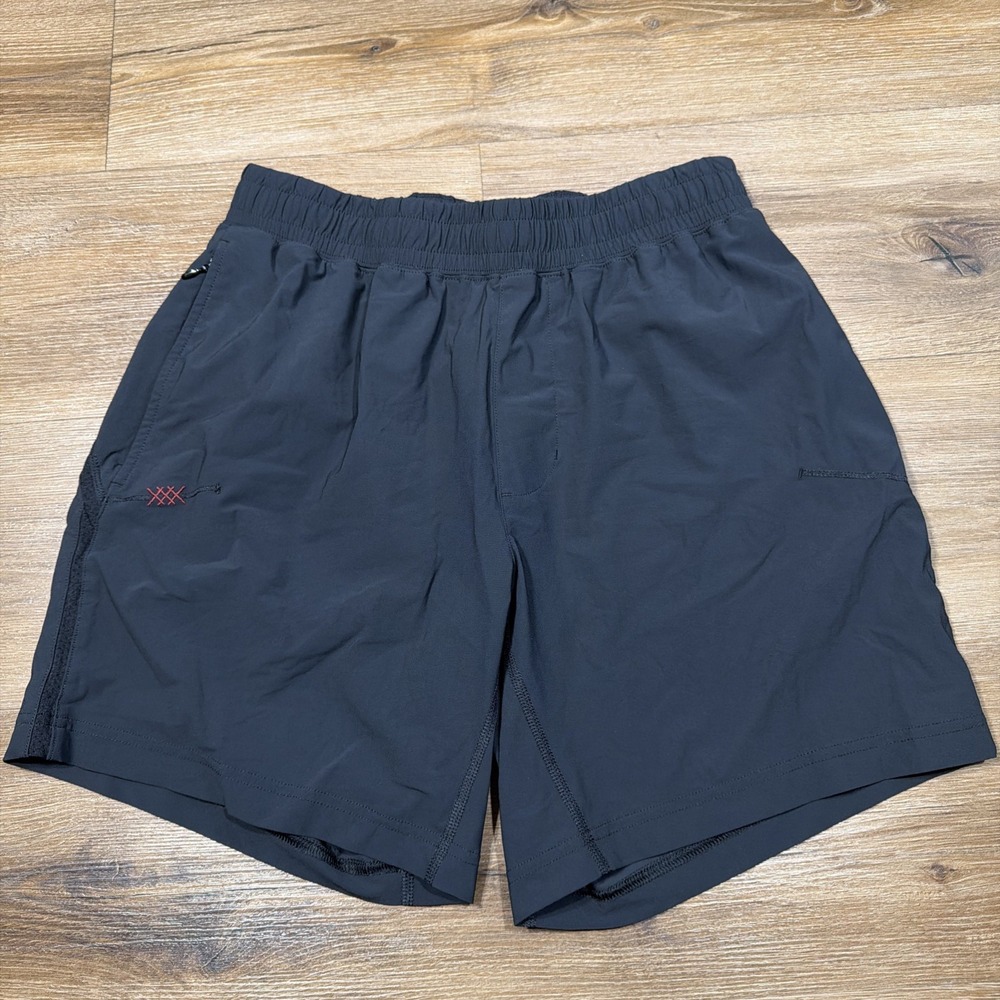 Rhone Versatility Shorts Men's MEDIUM Performance UNLINED 7" Stretch Wicking Blk
